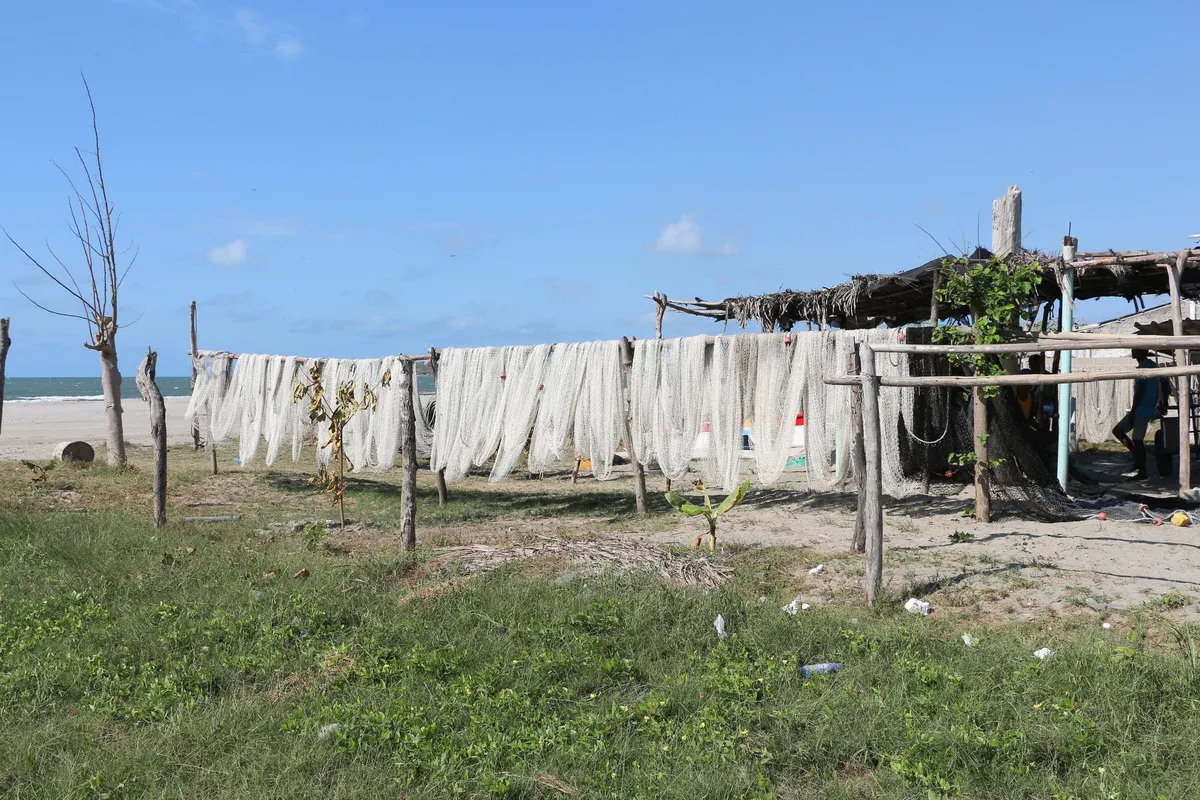 Fishing nets drying on the sand at La Boquilla, the beach village neighbourhood on Cartagena's northern edge